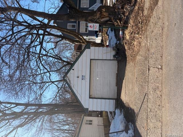 85 Grove Street Newburgh, NY 12550 - Photo 4 of 14 a view of a yard covered in snow