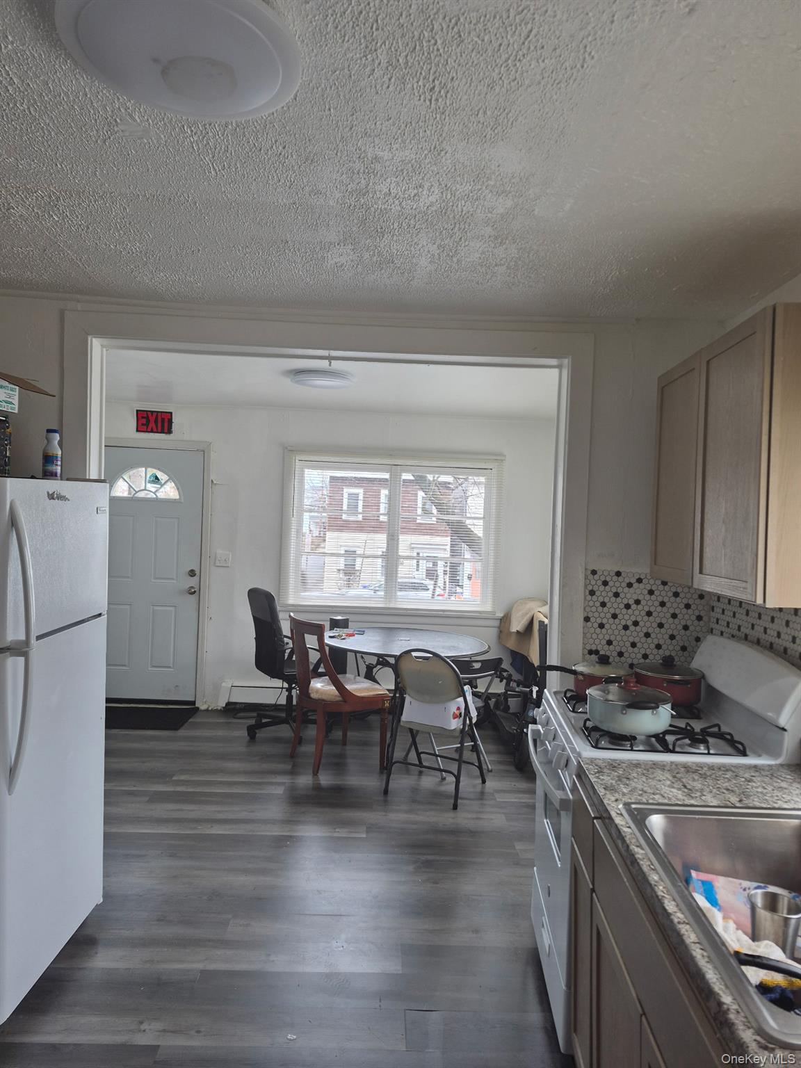 85 Grove Street Newburgh, NY 12550 - Photo 5 of 14 a living room with furniture and a large window
