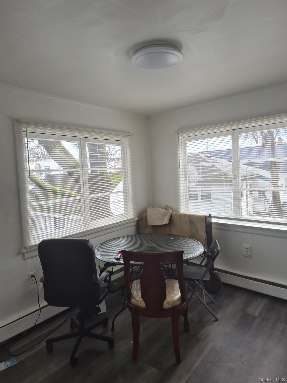85 Grove Street Newburgh, NY 12550 - Photo 7 of 14 a view of a dining room with a table and chairs