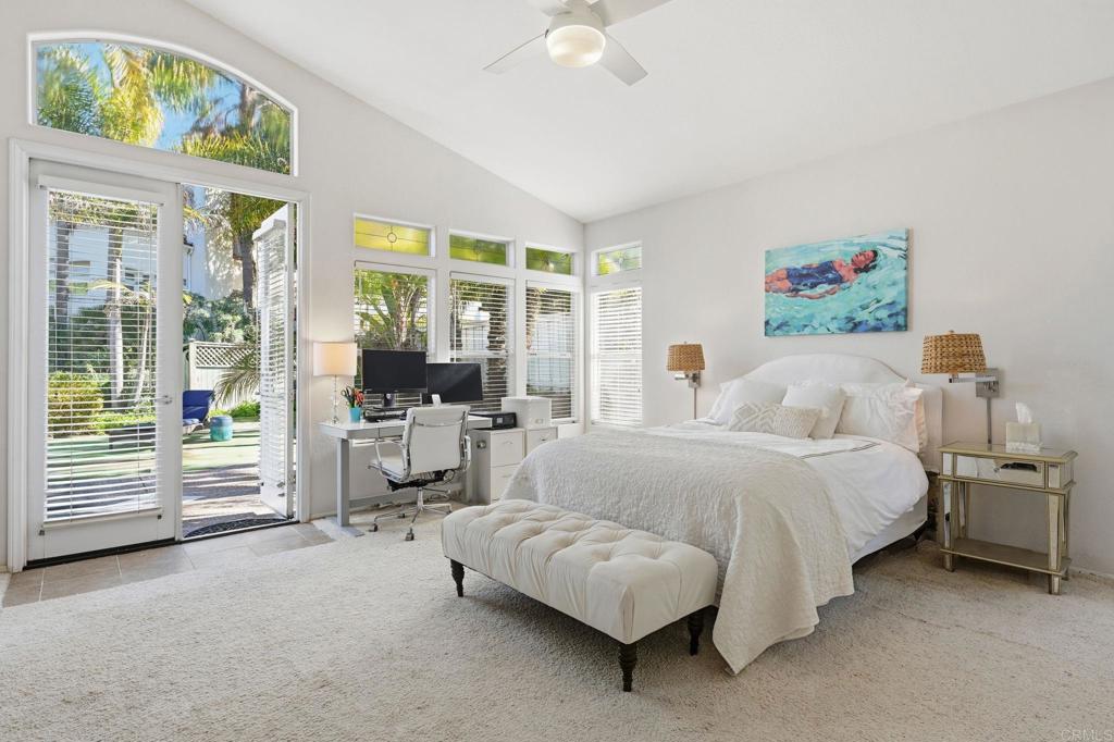3602 Tulare Court Oceanside, CA 92056 - Photo 15 of 35 a spacious bedroom with a bed and a large window