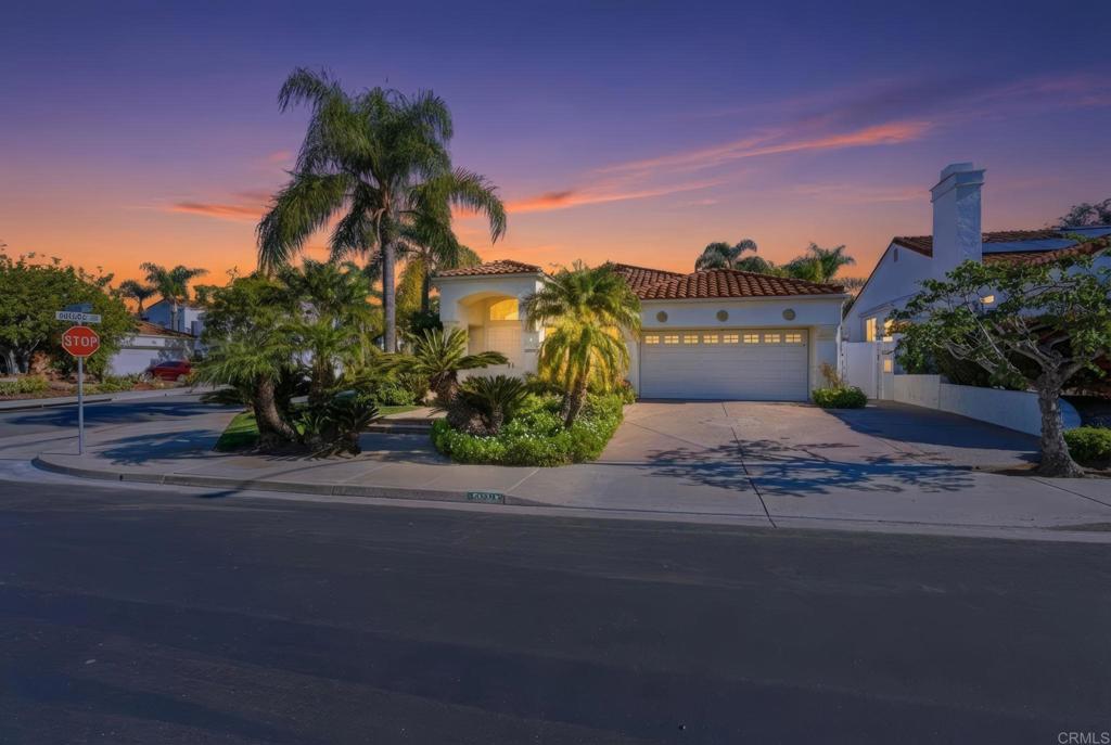3602 Tulare Court Oceanside, CA 92056 - Photo 2 of 35 a front view of a house with a yard and a garage