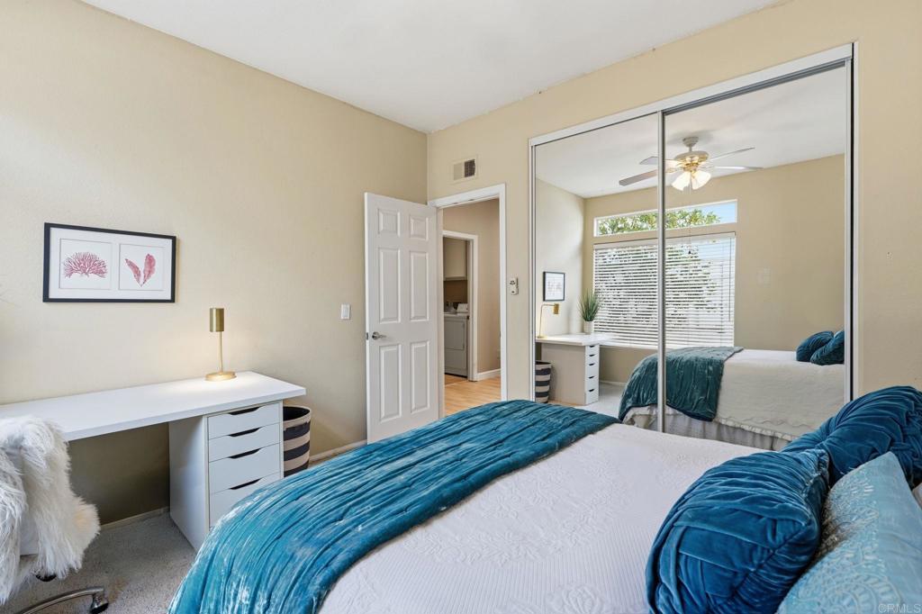 3602 Tulare Court Oceanside, CA 92056 - Photo 22 of 35 a bedroom with a bed and a window