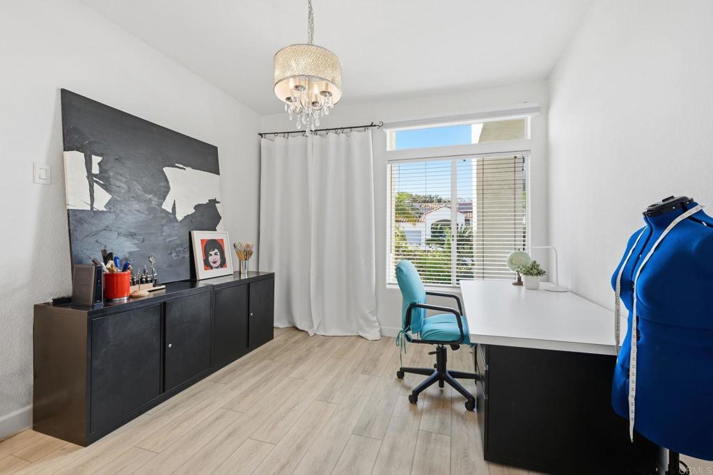 3602 Tulare Court Oceanside, CA 92056 - Photo 24 of 35 a view of a workspace with furniture and a window