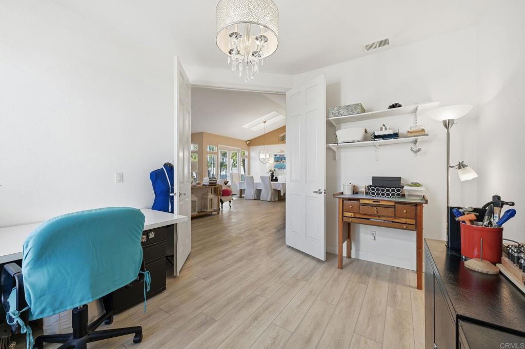 3602 Tulare Court Oceanside, CA 92056 - Photo 25 of 35 a view of a dining room with furniture and wooden floor