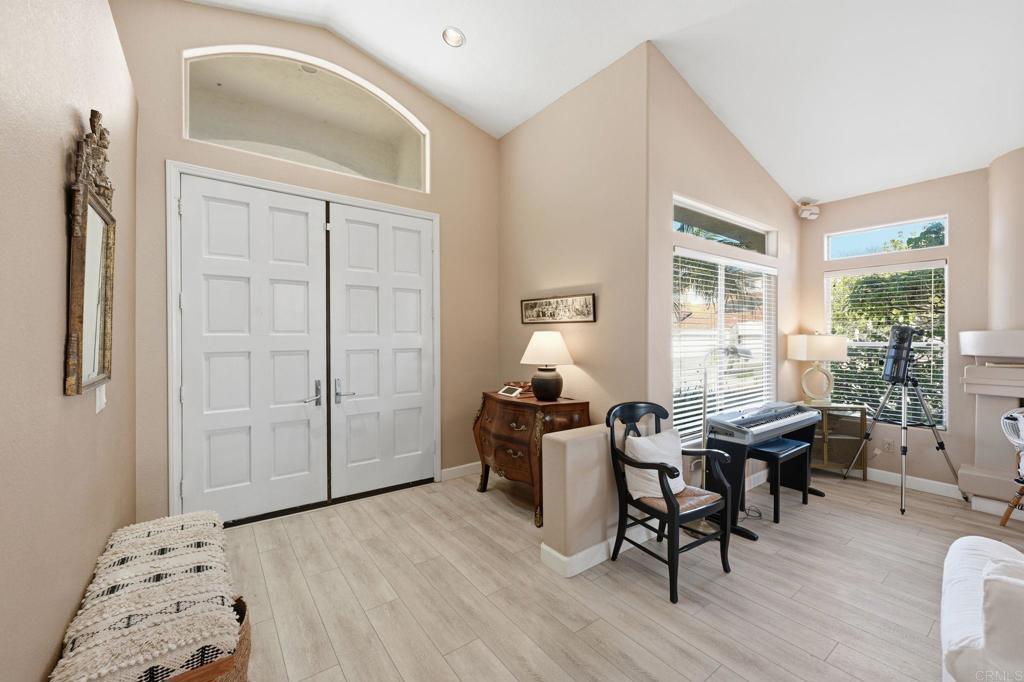 3602 Tulare Court Oceanside, CA 92056 - Photo 4 of 35 a workspace with furniture hardwood and windows