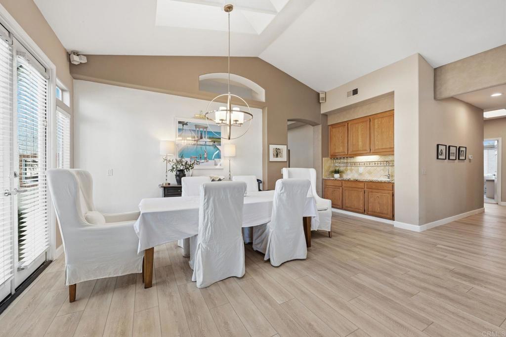 3602 Tulare Court Oceanside, CA 92056 - Photo 6 of 35 a view of a dining room with furniture window and wooden floor