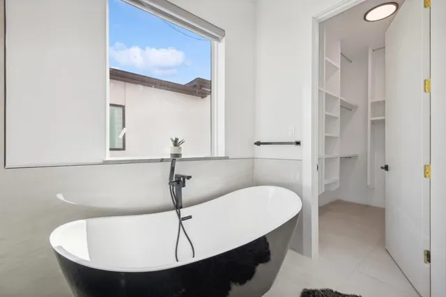 a bathroom with a sink and a bathtub