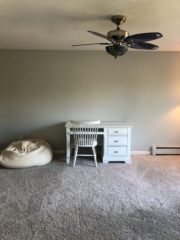 6 Nick Alan Circle Rutland, MA 01543 - Photo 16 of 39 a view of a room with a baby crib