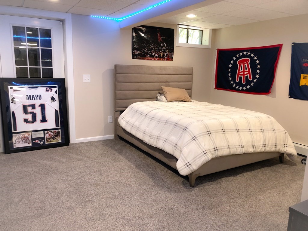 6 Nick Alan Circle Rutland, MA 01543 - Photo 22 of 39 a bed sitting in a bedroom next to a window