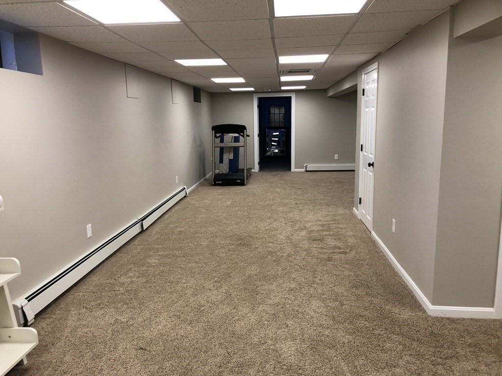 6 Nick Alan Circle Rutland, MA 01543 - Photo 26 of 39 an empty room with closet and a car parked in it