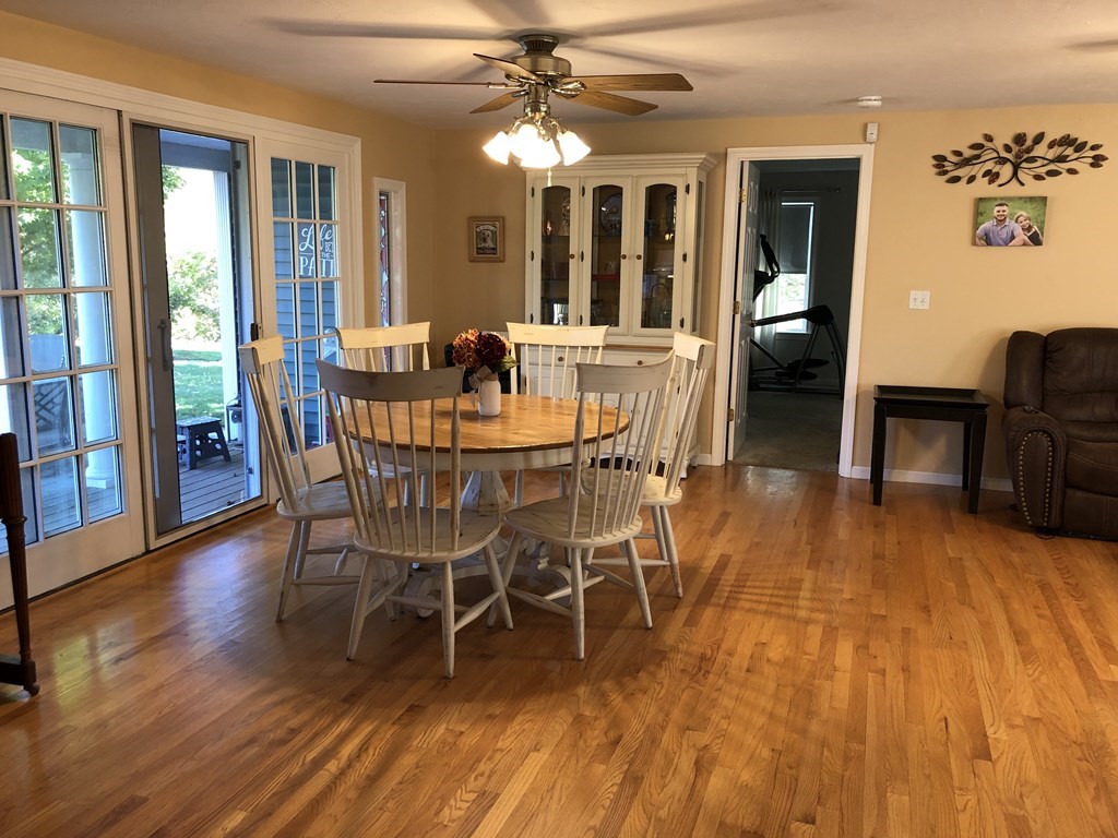 6 Nick Alan Circle Rutland, MA 01543 - Photo 4 of 39 a view of a dining room with furniture window and wooden floor