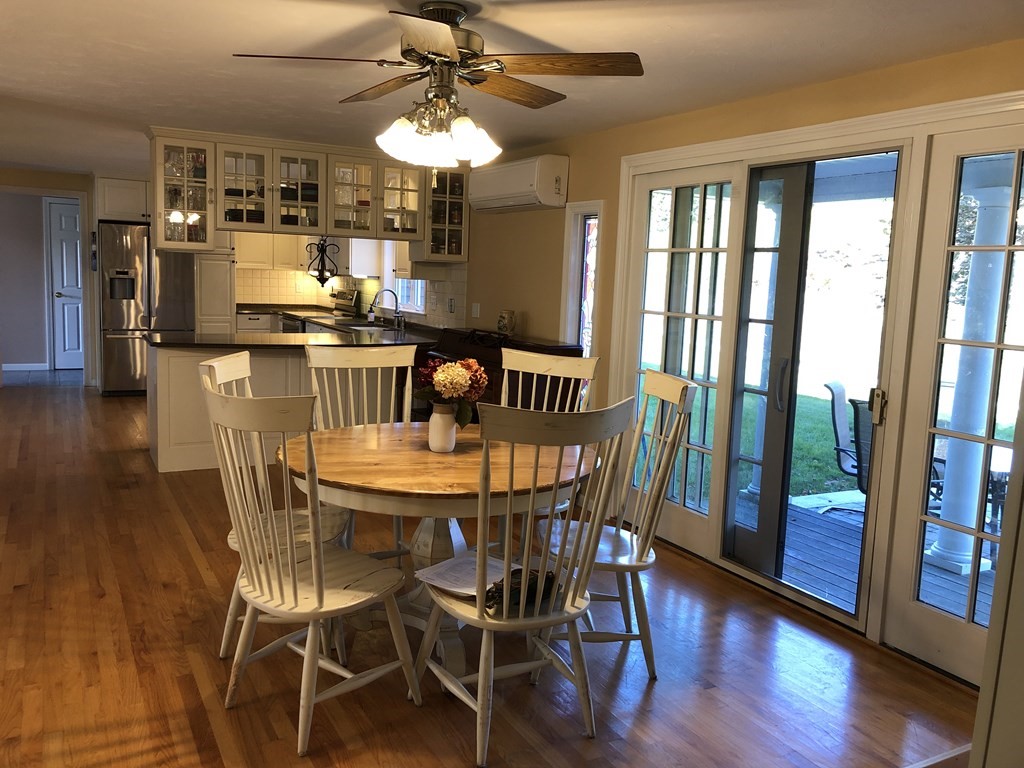 6 Nick Alan Circle Rutland, MA 01543 - Photo 5 of 39 a view of a dining room with furniture window and wooden floor