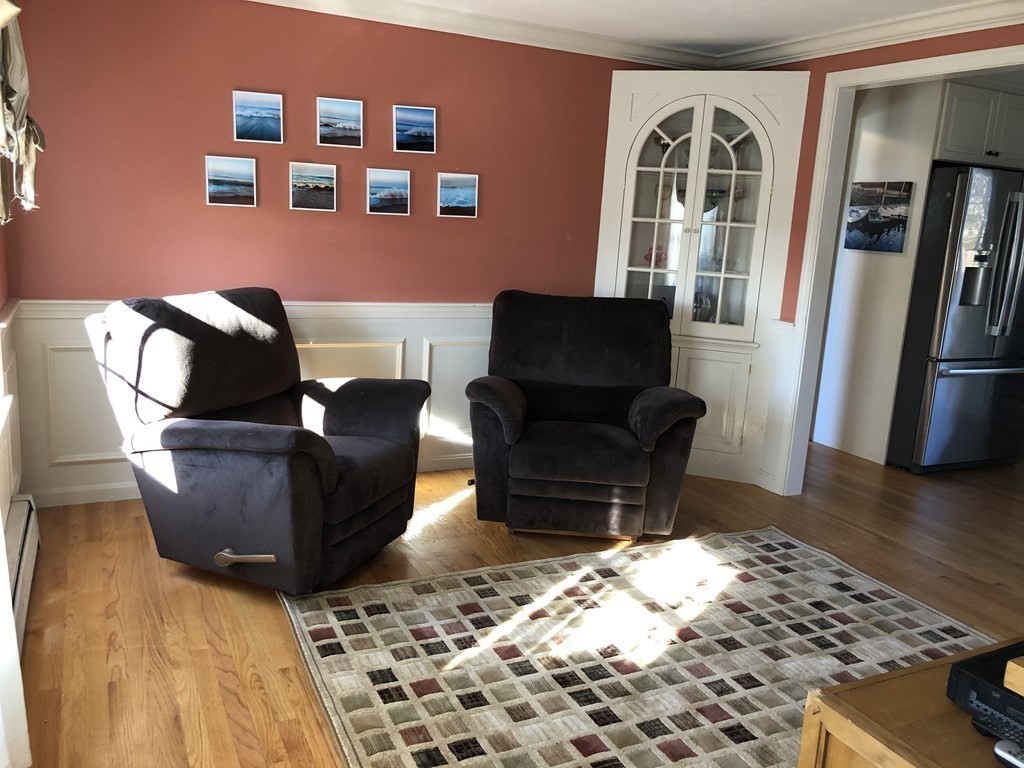 6 Nick Alan Circle Rutland, MA 01543 - Photo 8 of 39 a living room with furniture and a rug