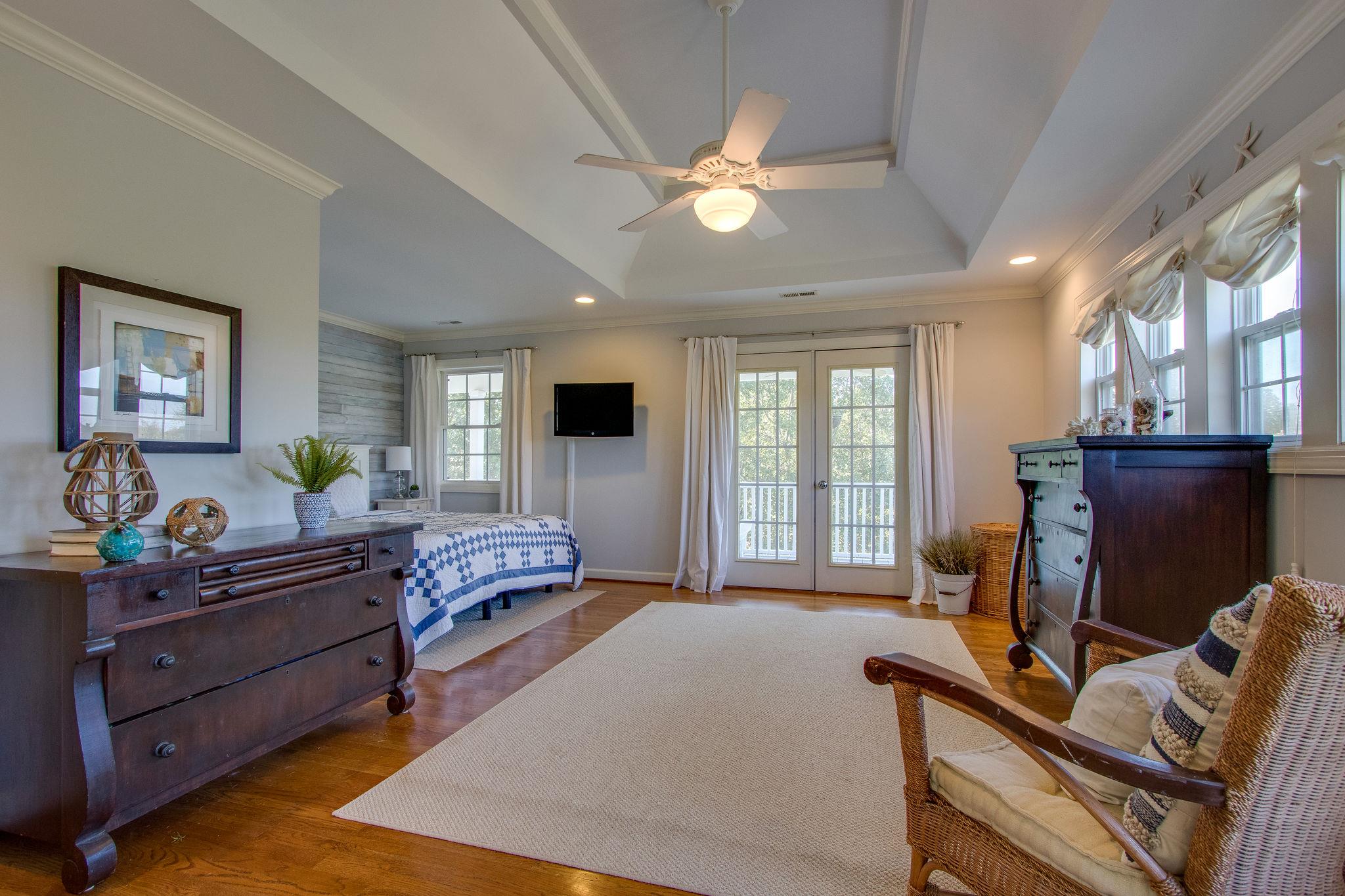 382 Lohman Road Mount Juliet, TN 37122 - Photo 16 of 30 a bed room with furniture and a flat screen tv