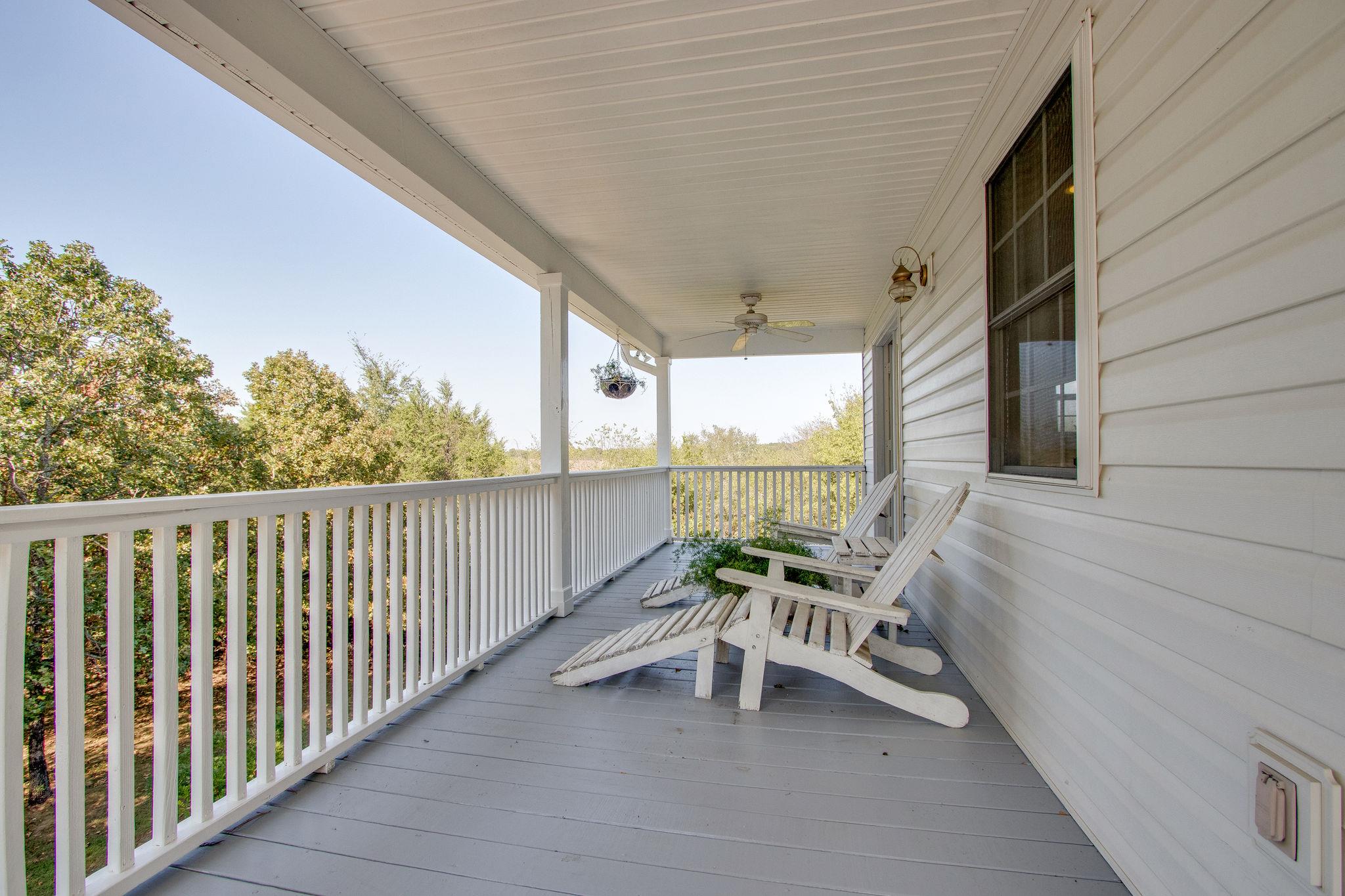 382 Lohman Road Mount Juliet, TN 37122 - Photo 20 of 30 a view of a chair and tables in the balcony