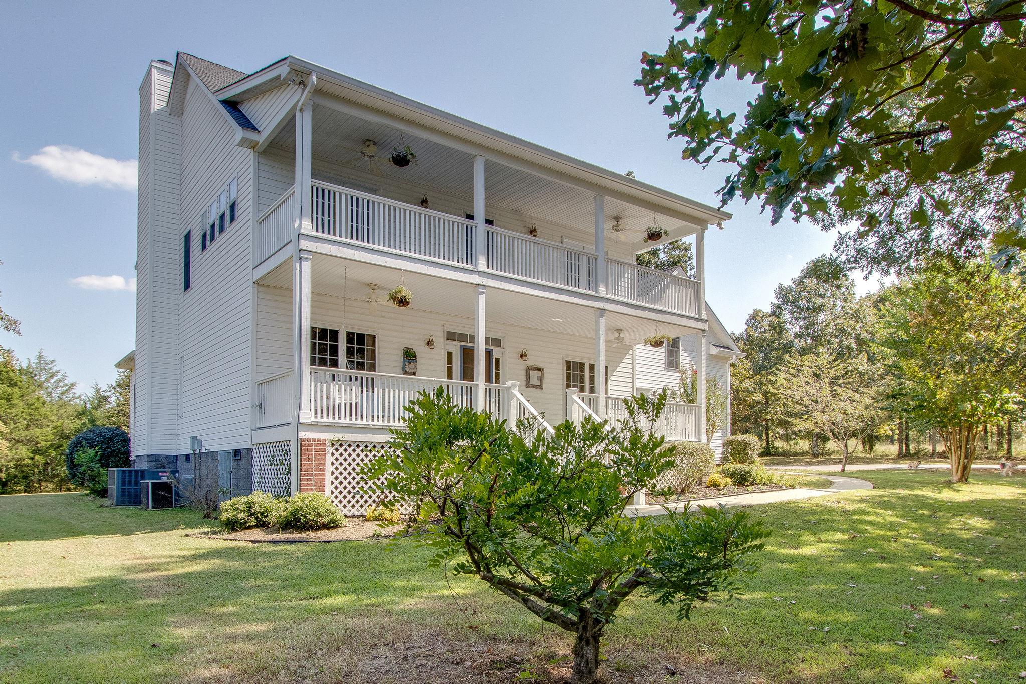 382 Lohman Road Mount Juliet, TN 37122 - Photo 26 of 30 a front view of a building with garden
