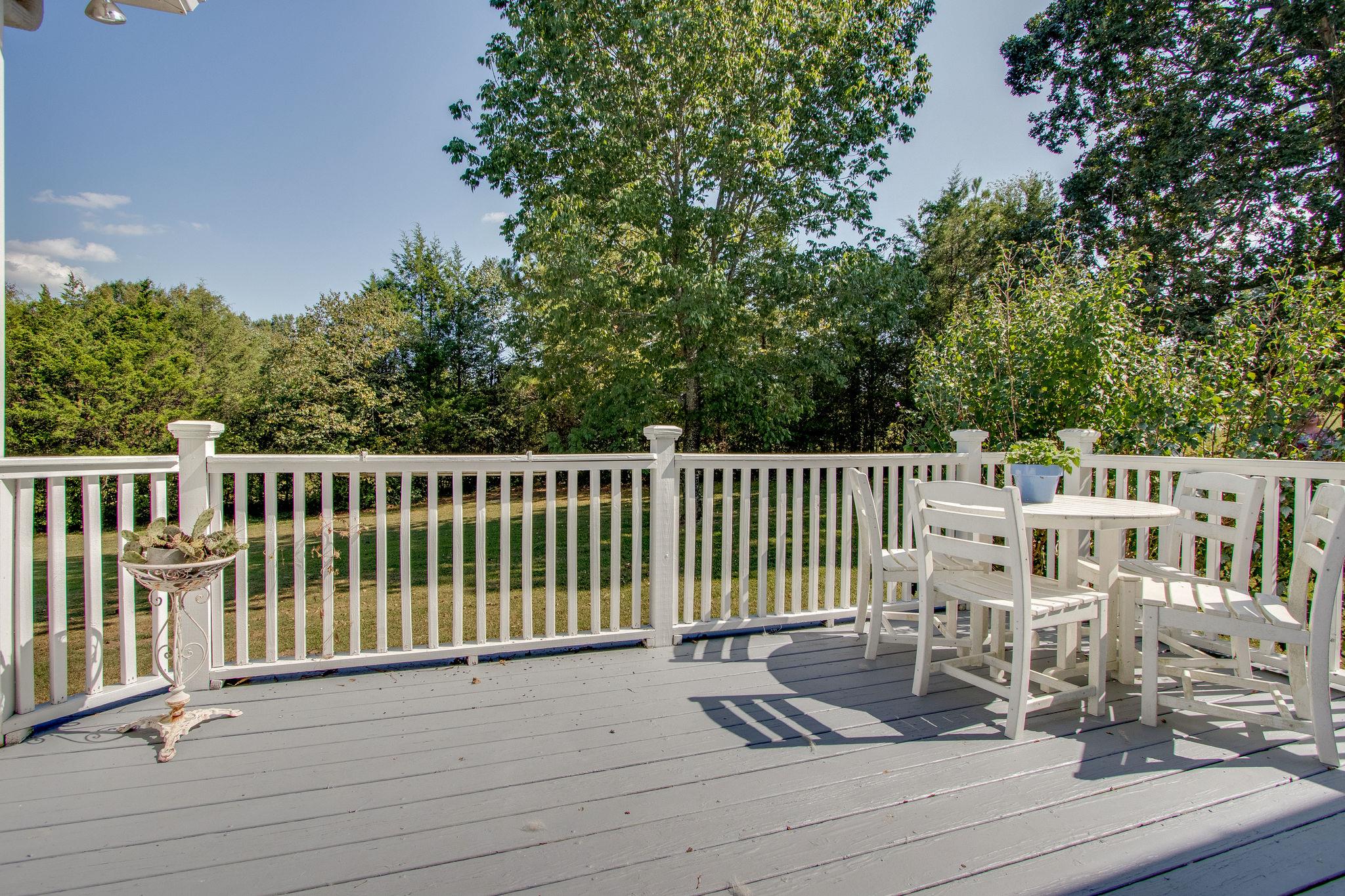 382 Lohman Road Mount Juliet, TN 37122 - Photo 28 of 30 a view of a chair and table on the wooden floor