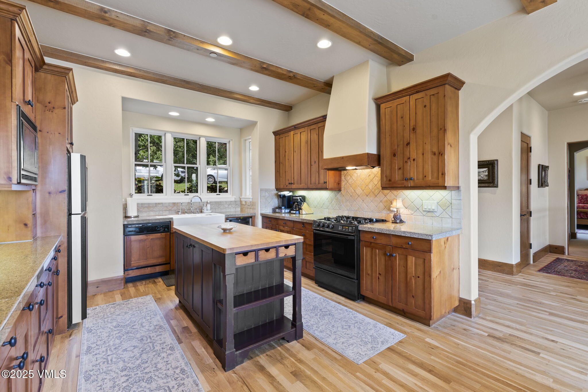 94 Eagles Glen Road Edwards, CO 81632 - Photo 13 of 43 a kitchen with a stove sink and a refrigerator
