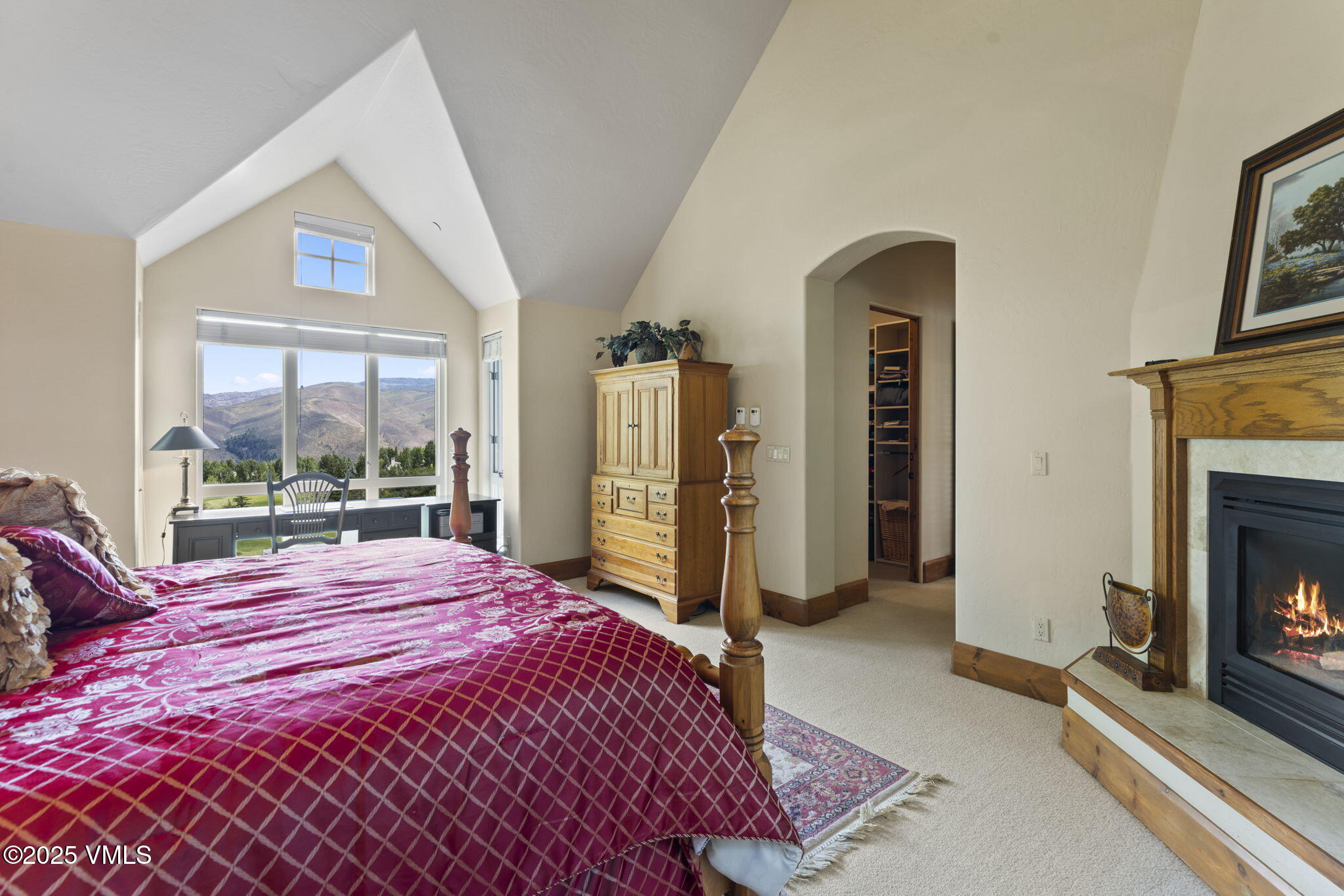 94 Eagles Glen Road Edwards, CO 81632 - Photo 20 of 43 a bedroom with a bed and a fireplace