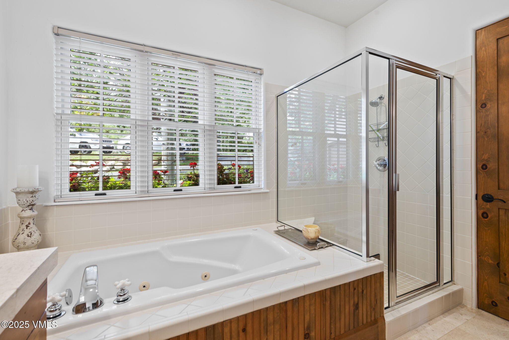 94 Eagles Glen Road Edwards, CO 81632 - Photo 23 of 43 a bathroom with a tub and a shower