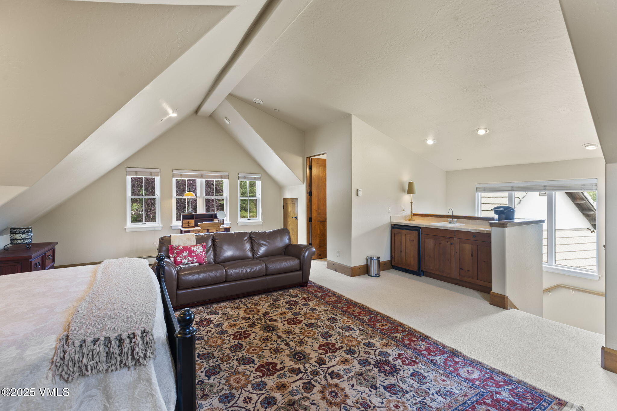 94 Eagles Glen Road Edwards, CO 81632 - Photo 25 of 43 a living room with furniture and a couch