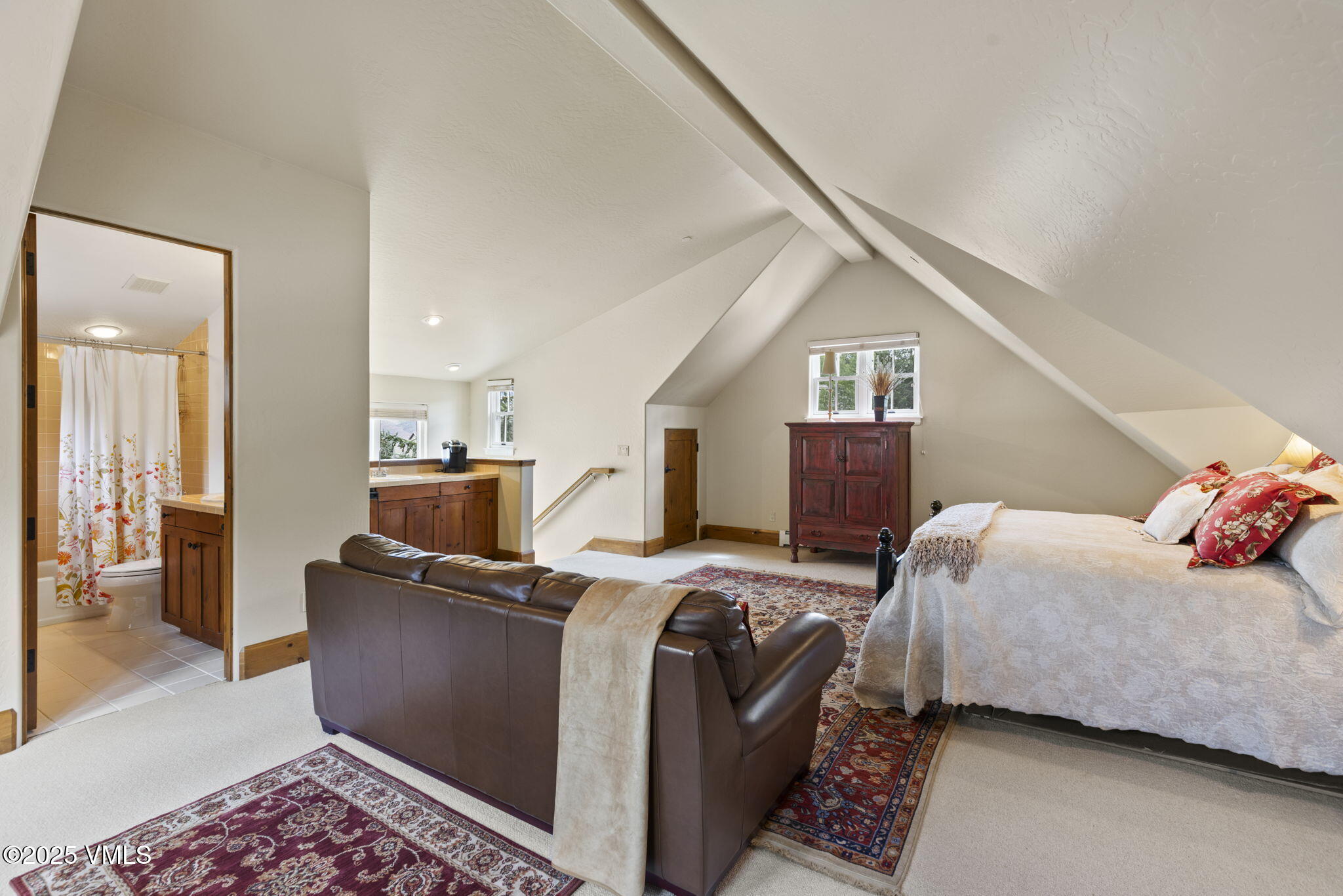 94 Eagles Glen Road Edwards, CO 81632 - Photo 26 of 43 a bed room with a bed and a couch