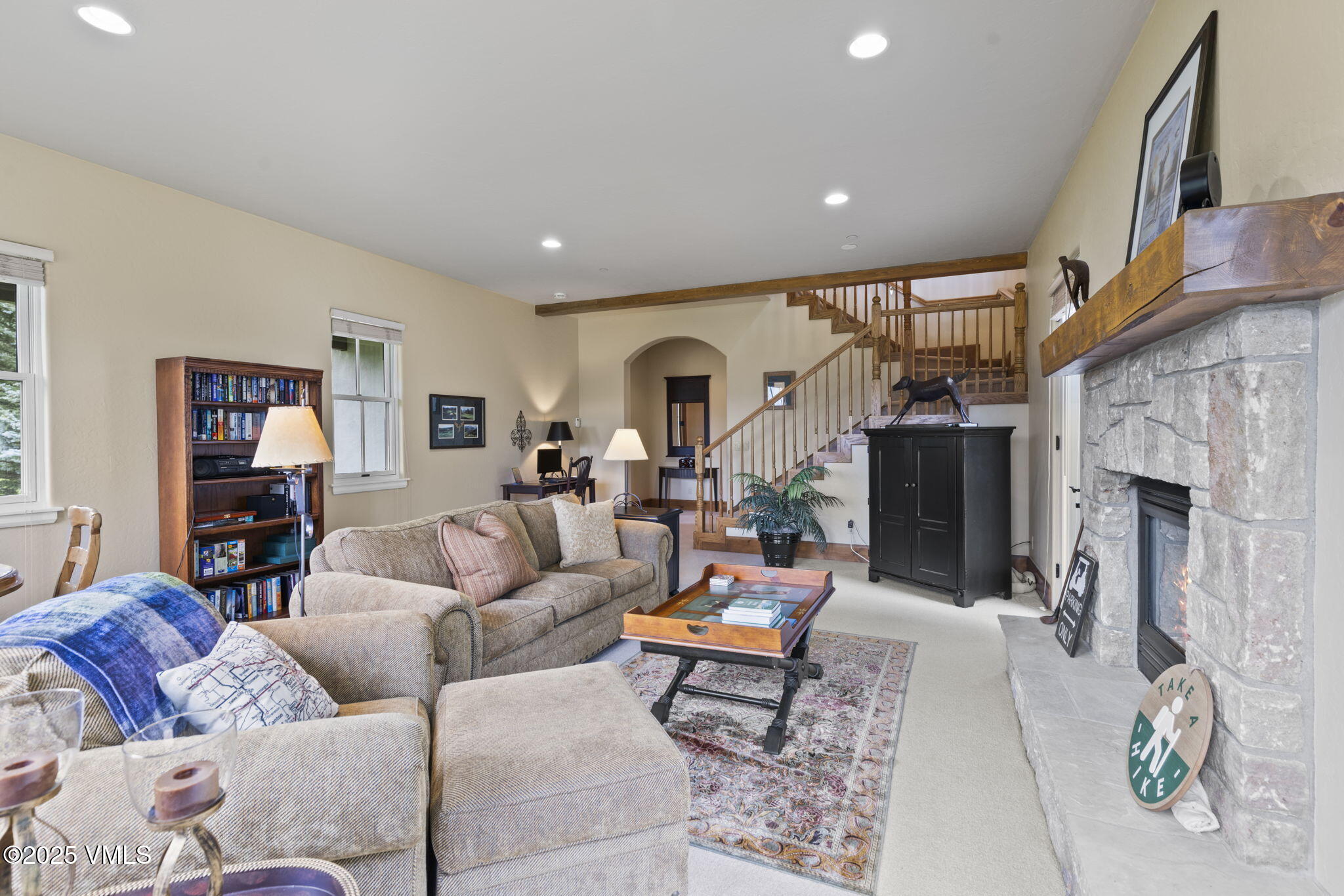 94 Eagles Glen Road Edwards, CO 81632 - Photo 30 of 43 a living room with furniture and a fireplace