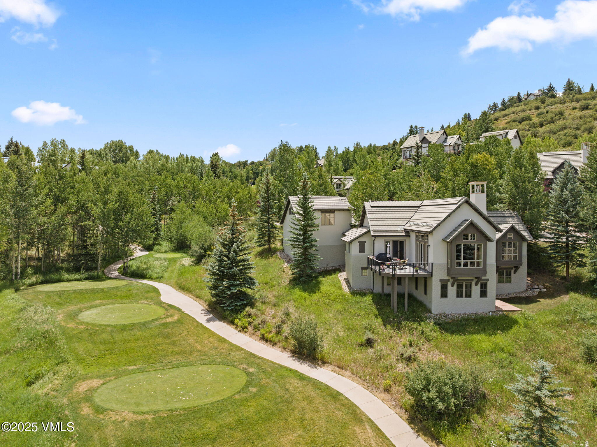 94 Eagles Glen Road Edwards, CO 81632 - Photo 3 of 43 a view of a house with big yard and large trees
