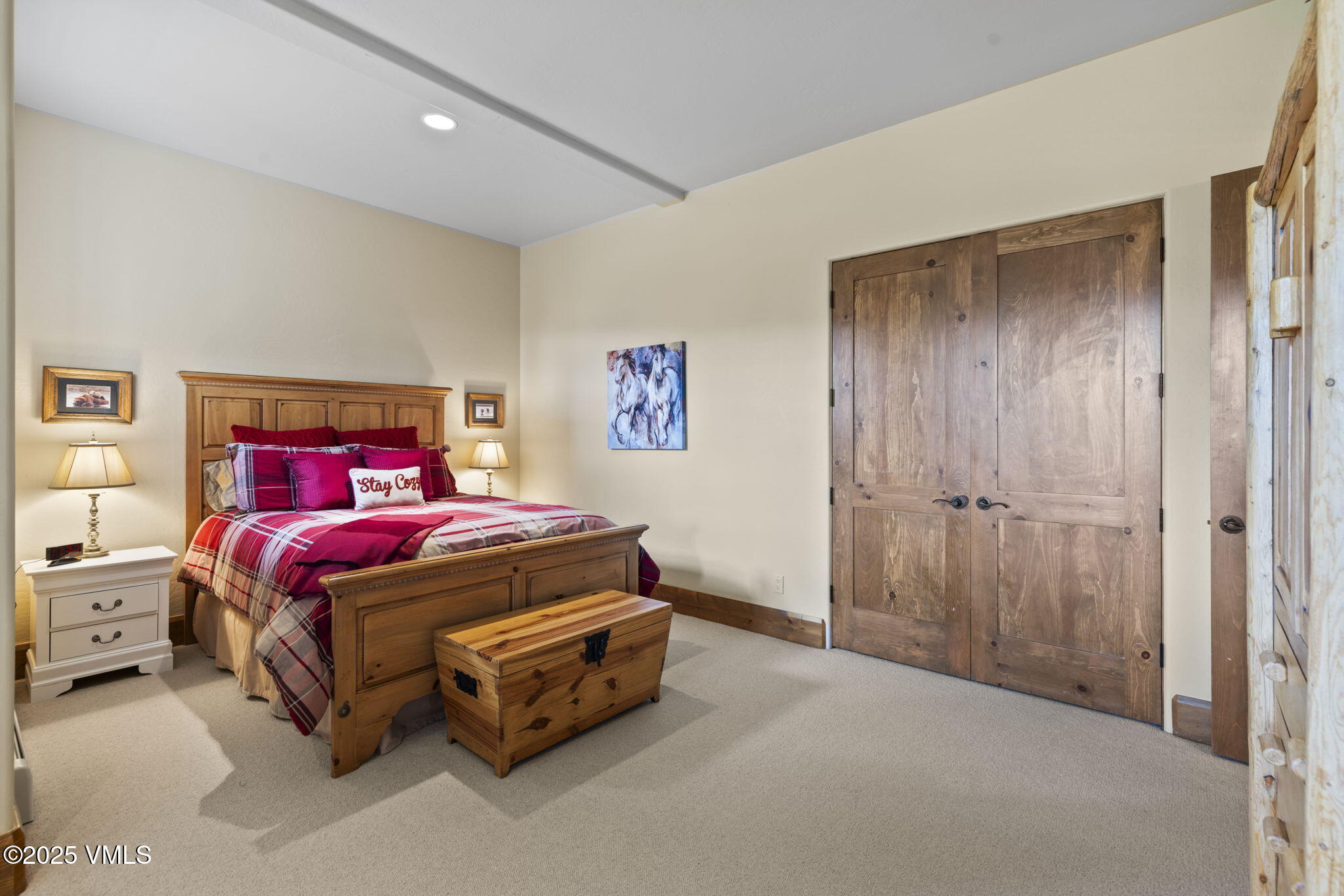 94 Eagles Glen Road Edwards, CO 81632 - Photo 32 of 43 a bedroom with a bed and a cabinets