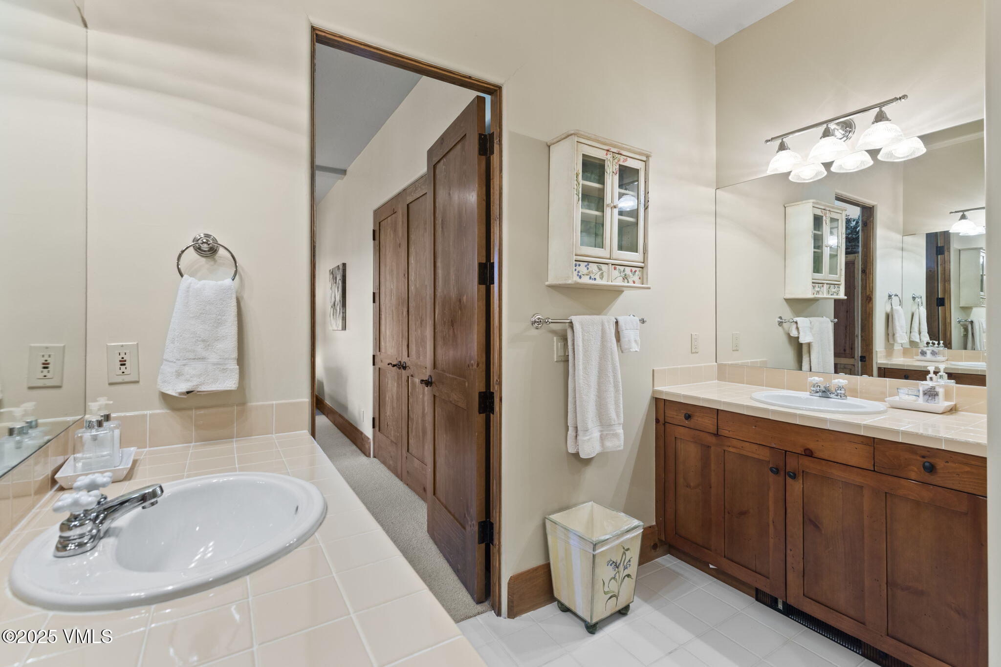 94 Eagles Glen Road Edwards, CO 81632 - Photo 35 of 43 a bathroom with a sink double vanity granite tub and shower