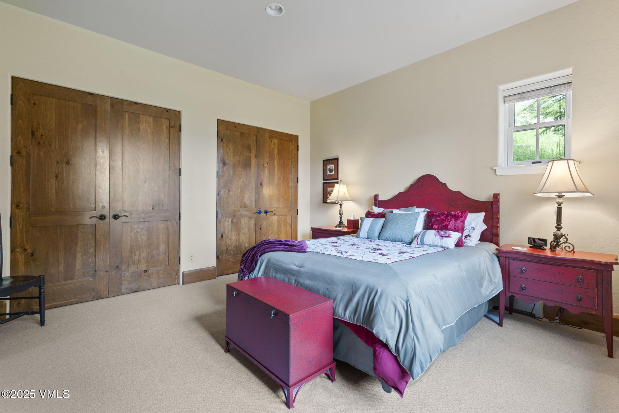 94 Eagles Glen Road Edwards, CO 81632 - Photo 38 of 43 a bedroom with a bed and a table