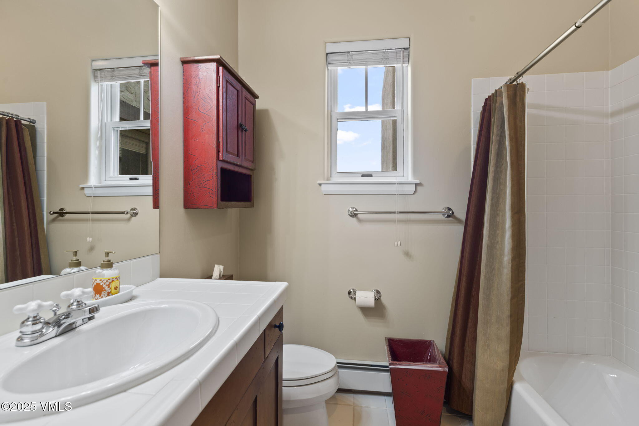 94 Eagles Glen Road Edwards, CO 81632 - Photo 39 of 43 a bathroom with a sink a toilet and a mirror