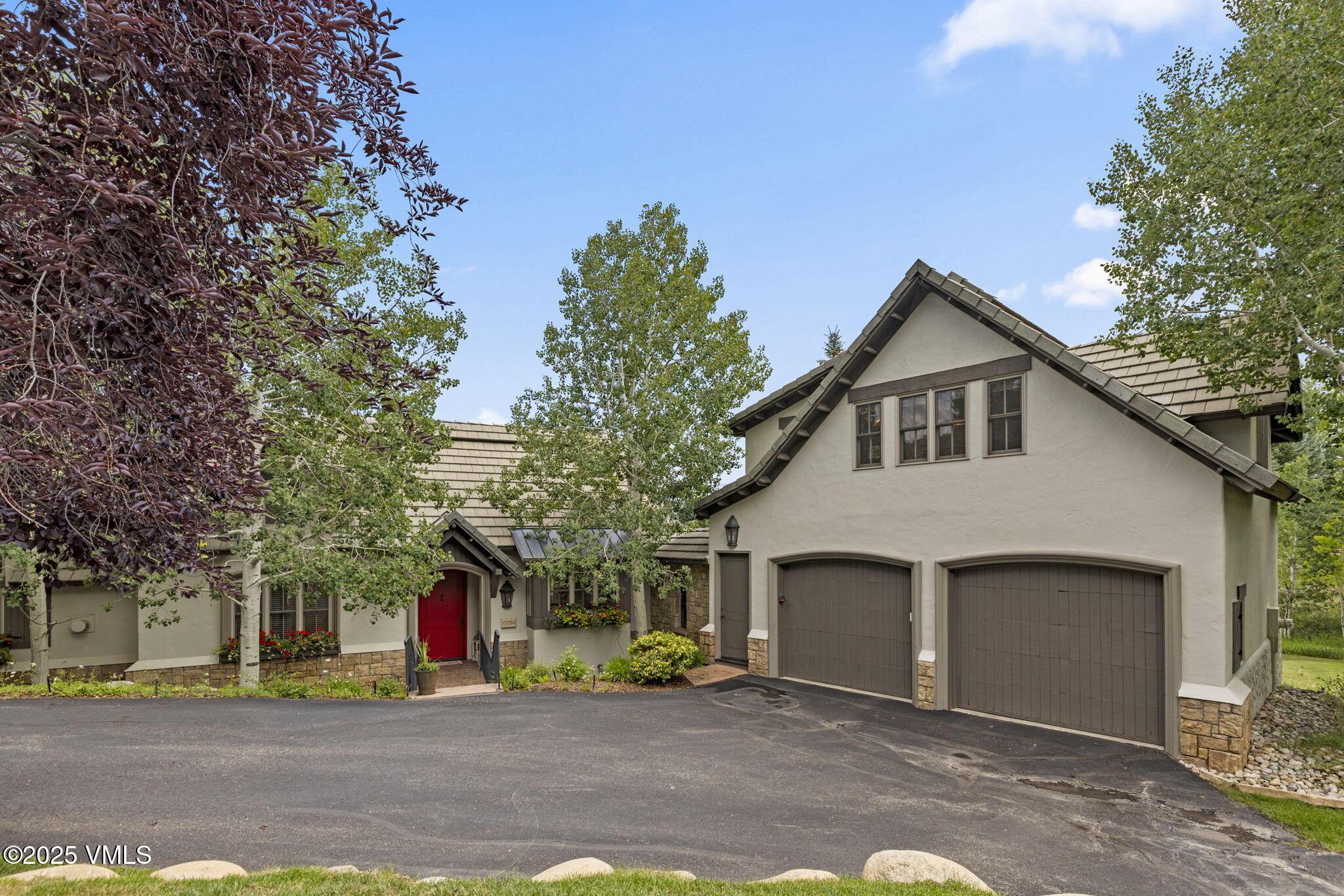 94 Eagles Glen Road Edwards, CO 81632 - Photo 40 of 43 a front view of a house with a garage