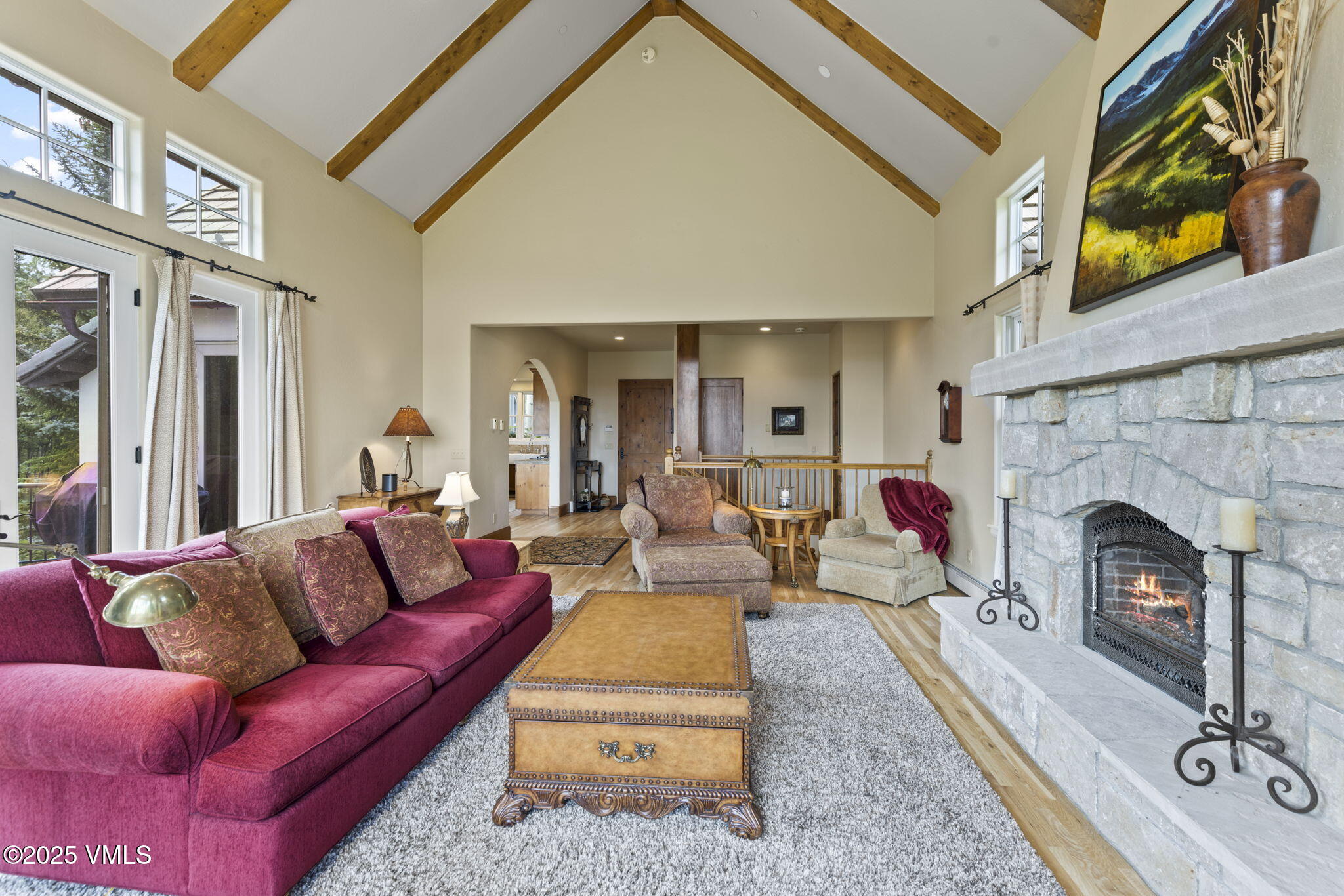 94 Eagles Glen Road Edwards, CO 81632 - Photo 6 of 43 a living room with furniture a fireplace and a flat screen tv