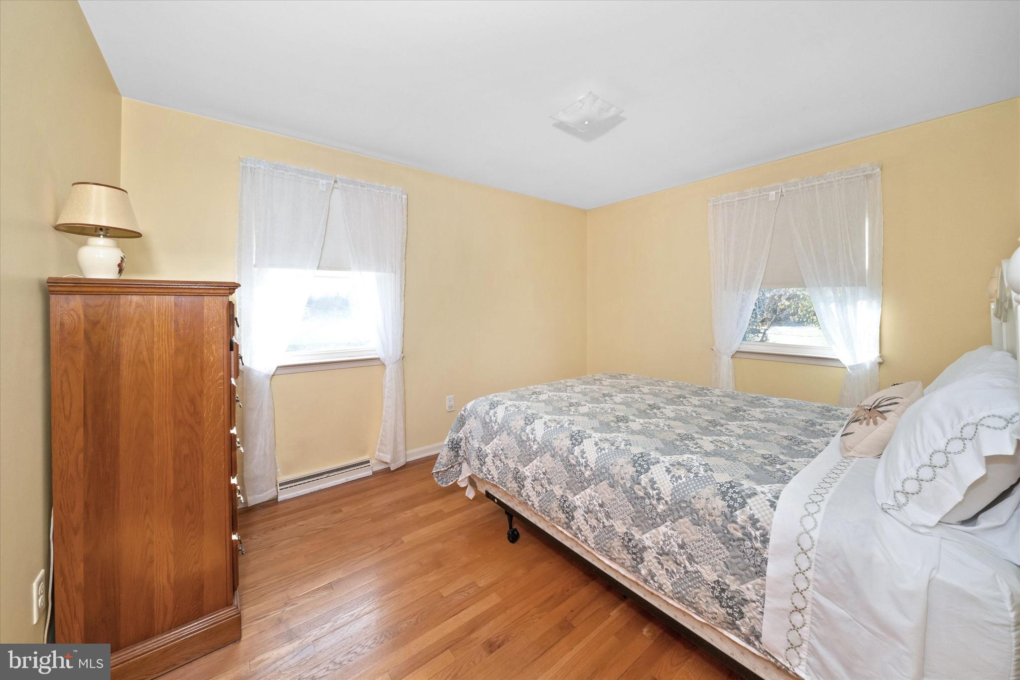 213 Valley Lane Hockessin, DE 19707 - Photo 18 of 27 a bedroom with a bed and a window