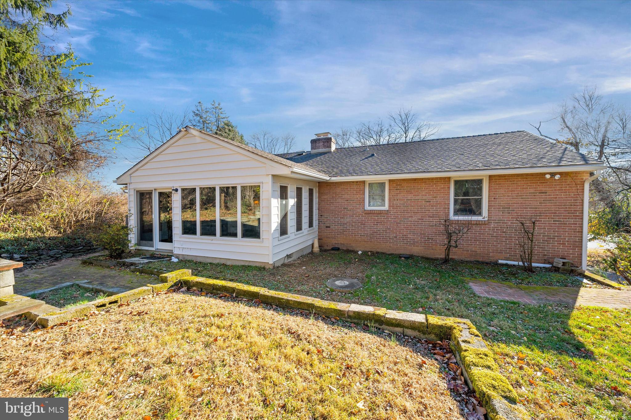213 Valley Lane Hockessin, DE 19707 - Photo 24 of 27 a front view of a house with garden