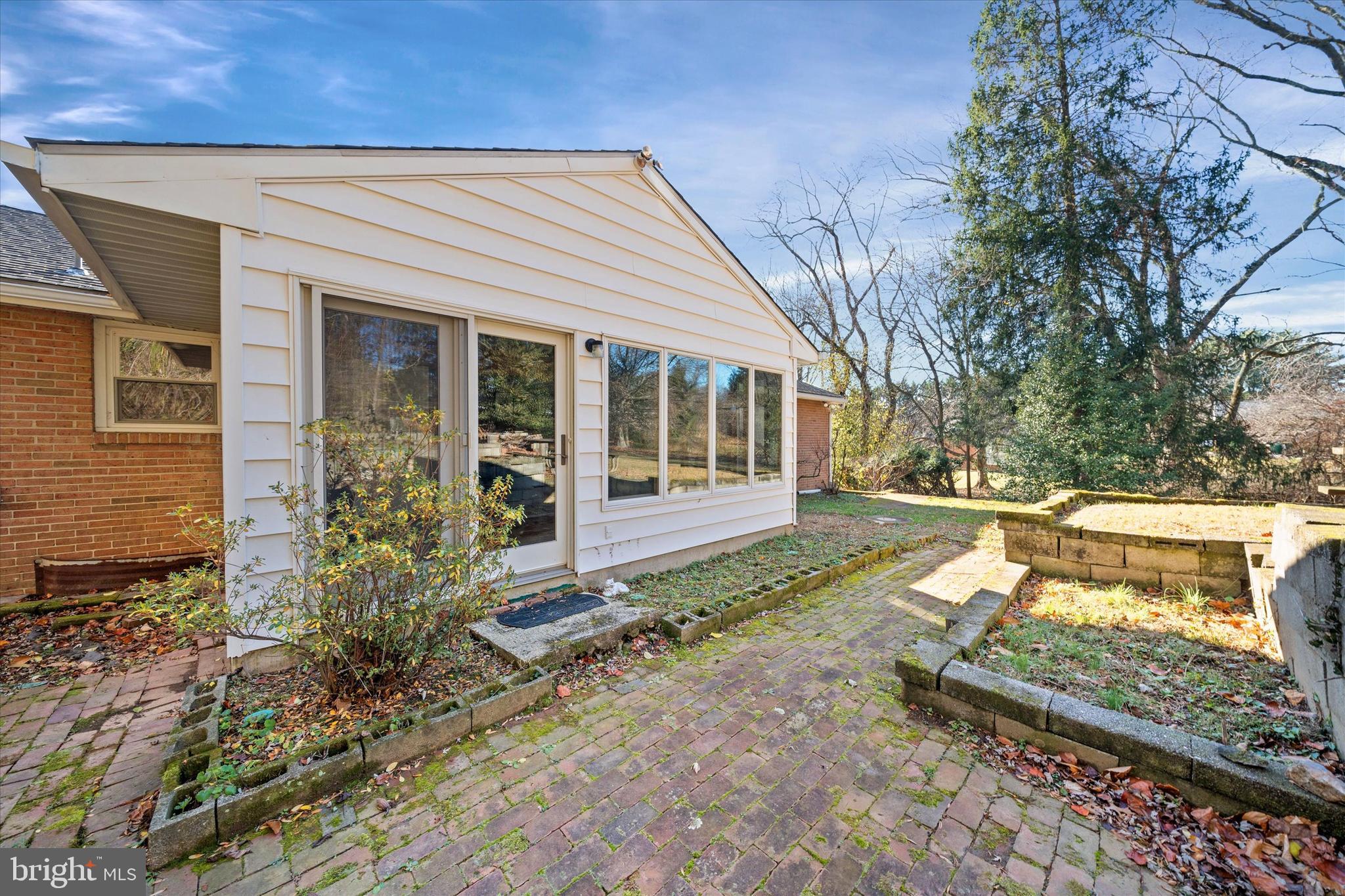 213 Valley Lane Hockessin, DE 19707 - Photo 25 of 27 a view of a house with a yard