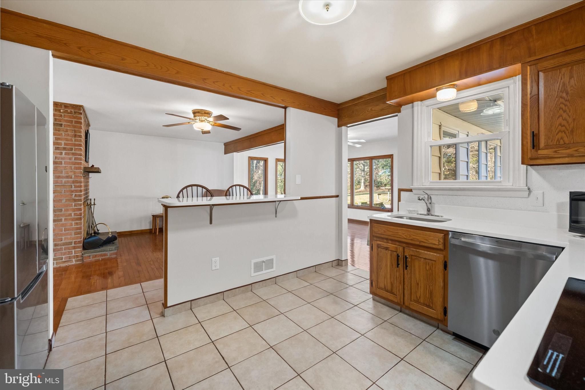 213 Valley Lane Hockessin, DE 19707 - Photo 8 of 27 a kitchen with granite countertop a sink and a stove