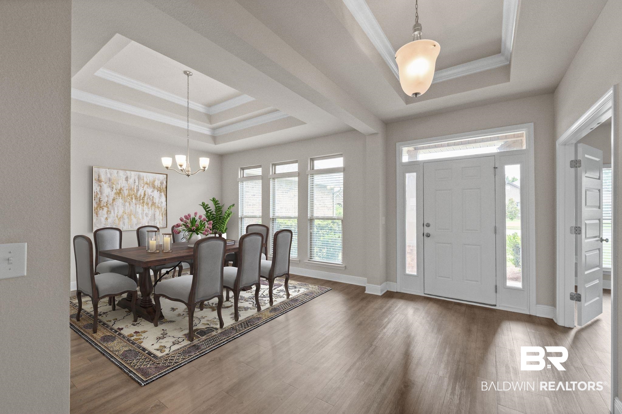 2074 Bourbon Street Foley, AL 36535 - Photo 4 of 46 Entrance foyer featuring crown molding, dark wood-type flooring, a chandelier, and a tray ceiling