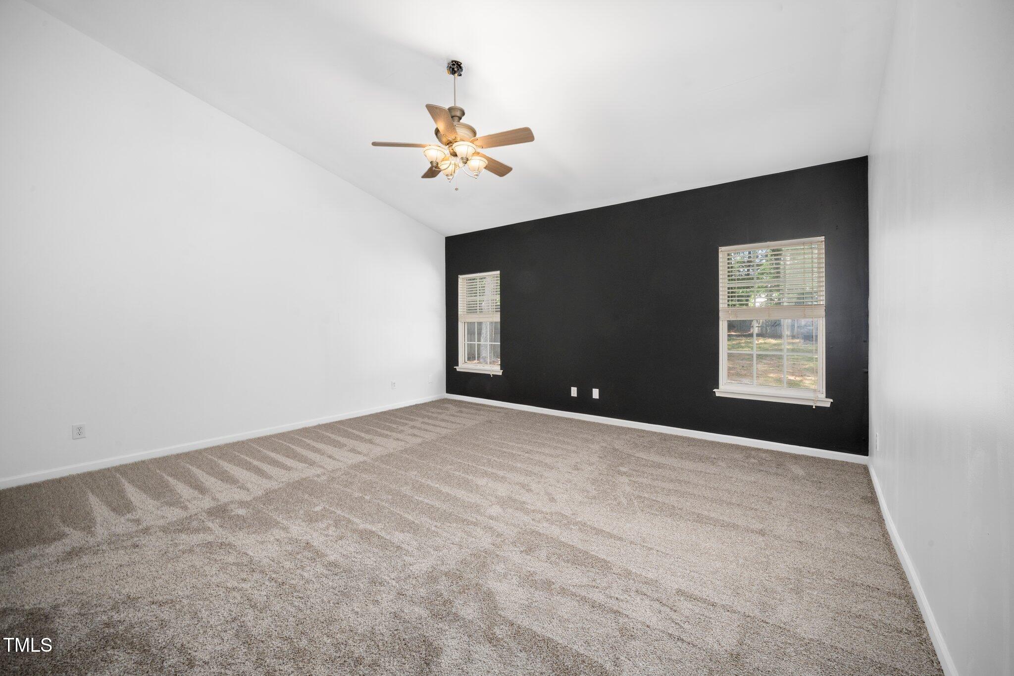 8300 Neuse Hunter Drive Raleigh, NC 27616 - Photo 15 of 32 a view of an empty room with a window