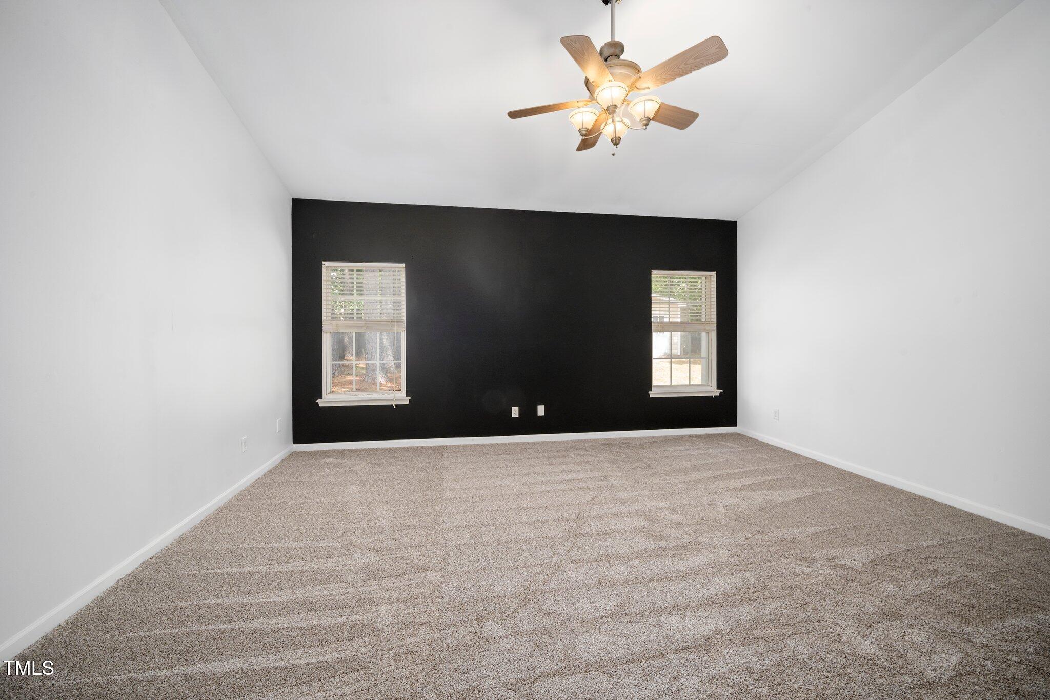 8300 Neuse Hunter Drive Raleigh, NC 27616 - Photo 16 of 32 a view of an empty room with a window