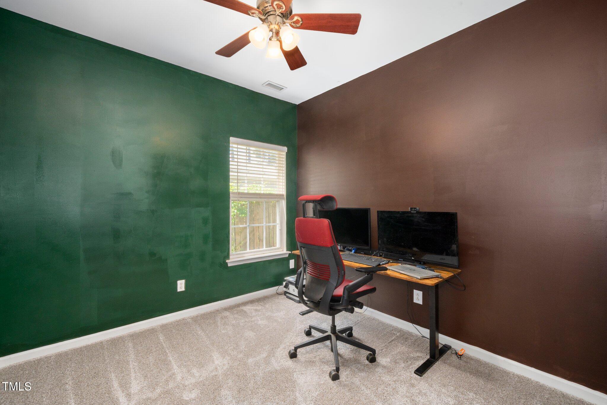 8300 Neuse Hunter Drive Raleigh, NC 27616 - Photo 21 of 32 a view of a workspace with a window
