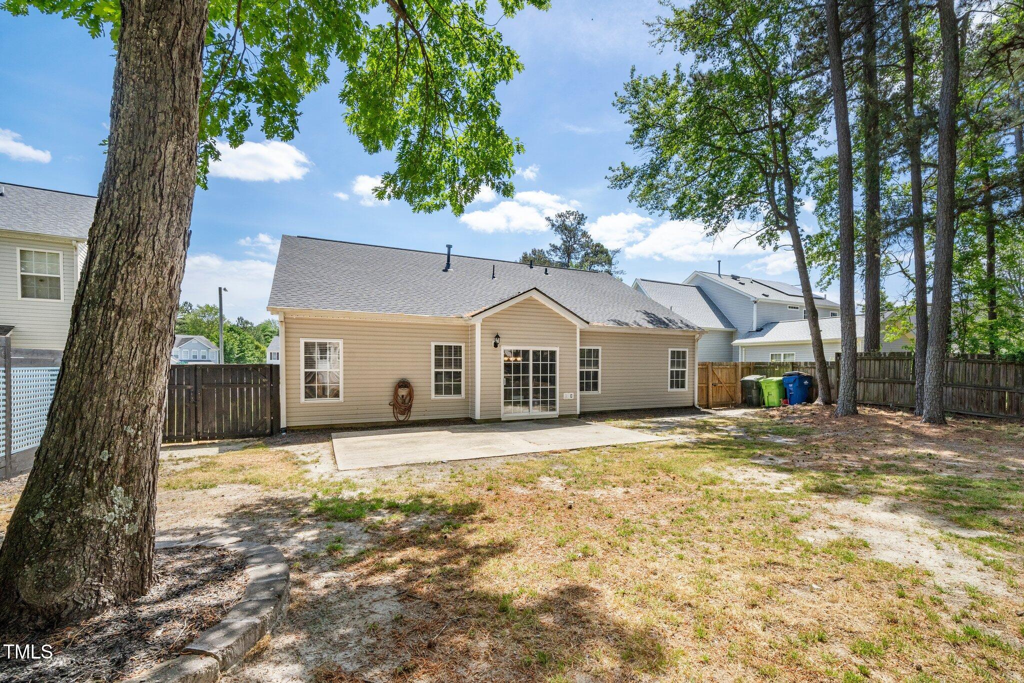 8300 Neuse Hunter Drive Raleigh, NC 27616 - Photo 25 of 32 a front view of a house with a yard