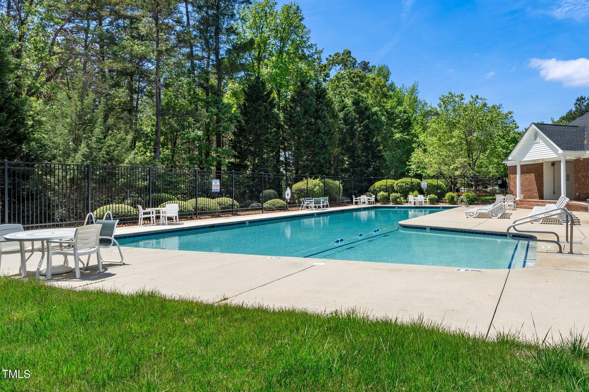 8300 Neuse Hunter Drive Raleigh, NC 27616 - Photo 32 of 32 a view of a swimming pool with a patio
