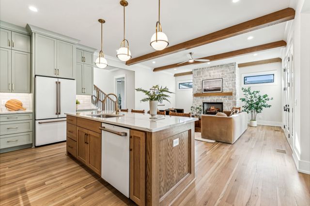 a view of a room with shelves on the wall