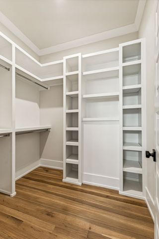 a view of an empty walk in closet