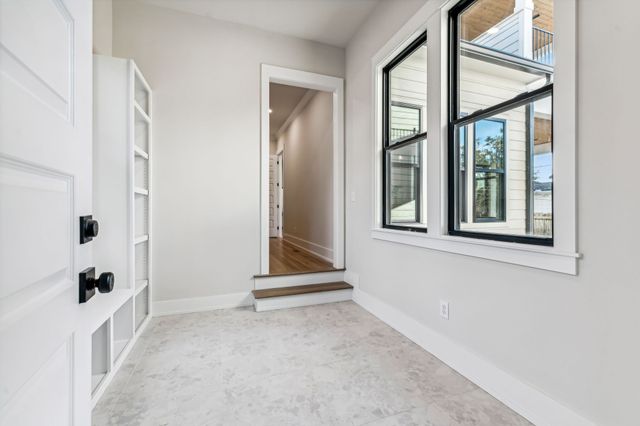 a bathroom with a sink vanity and a mirror