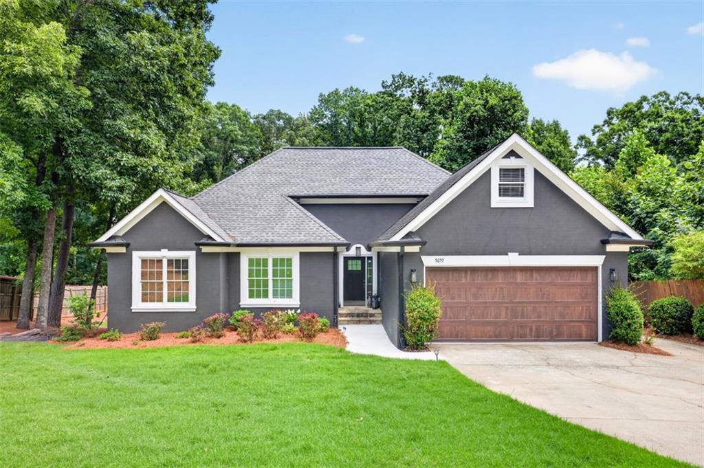 5659 Lakeshore Road Buford, GA 30518 - Photo 1 of 80