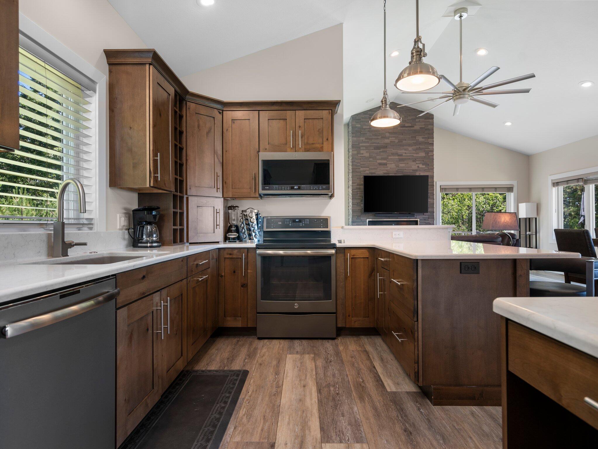 15241 Maxey Road Arcadia, MI 49613 - Photo 7 of 81 Dramatic high ceilings in great kitchen