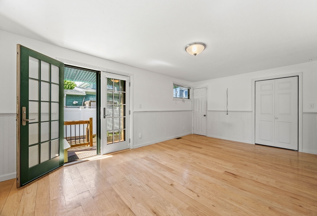 7 Grove Street Wareham, MA 02558 - Photo 20 of 41 a view of an empty room with glass door